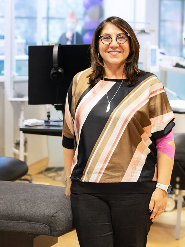 Donor who just gave blood standing with a smile