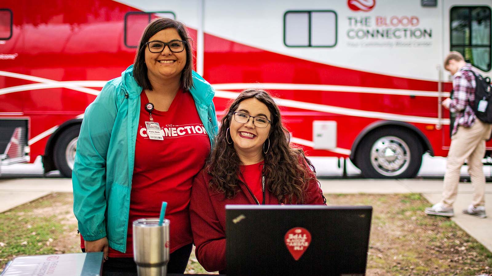 Two TBC employees at a blood drive