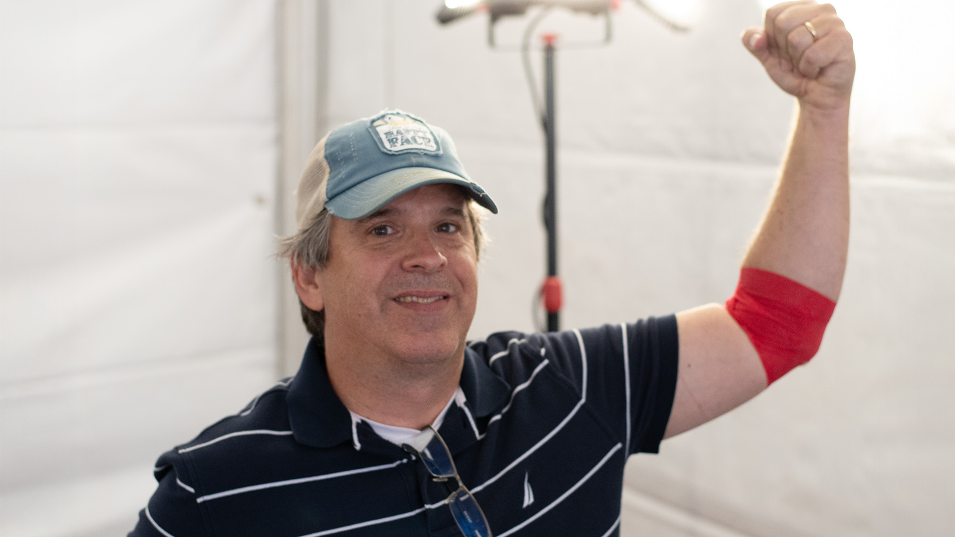 Donor flexing arm after giving blood