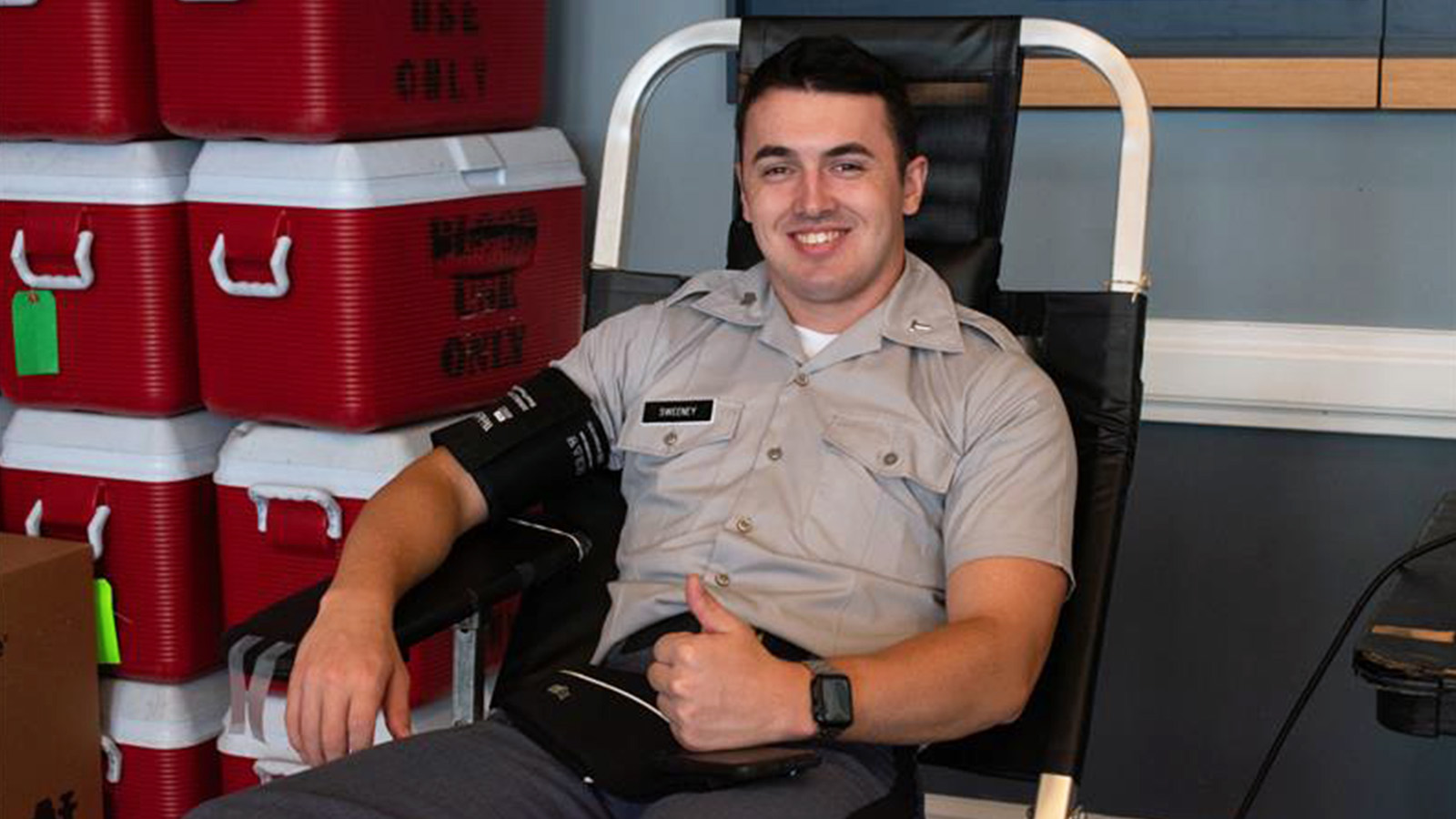 Man in donor chair giving blood
